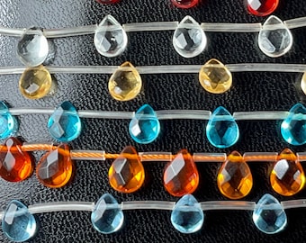 6x8 mm Faceted Flat Teardrops. Hand Cut Quartz Glass. 1mm top drilled hole. Sold per Lot (8 PCs).