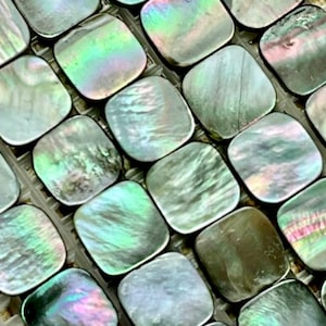 Rounded Squares. Black lip shell squares. 11 mm rounded Squares. Organic beads. 1 mm side drilled hole. Sold per Lot (8 PCs).