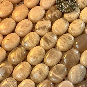 Natural Sunstones. Smooth Ovals, two sizes: 12x16mm, 10x14mm. 1 mm holes, Sold per Lot (8 PCs).