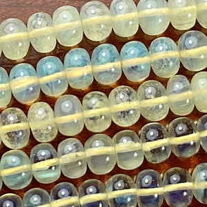 Pineapple Quartz. 6mm or 8mm Rondelle beads. 1 mm hole. Sold per strand (15 inches) or per Lot (20 PCs).