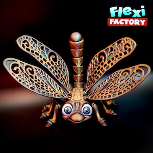 May include: A detailed, 3D-printed dragonfly sculpture with intricate wing patterns and a smiling face. The wings are a copper colour with green and blue accents. The sculpture has the text "Flexi Factory" in the upper right corner.
