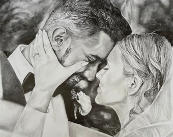May include: A black and white drawing of a couple embracing. The man is wearing a suit and the woman is wearing a white dress. They are both looking at each other with love and affection.