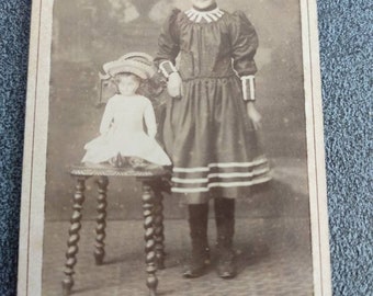 Antique cabinet card 1890, adorable girl with doll, very rare