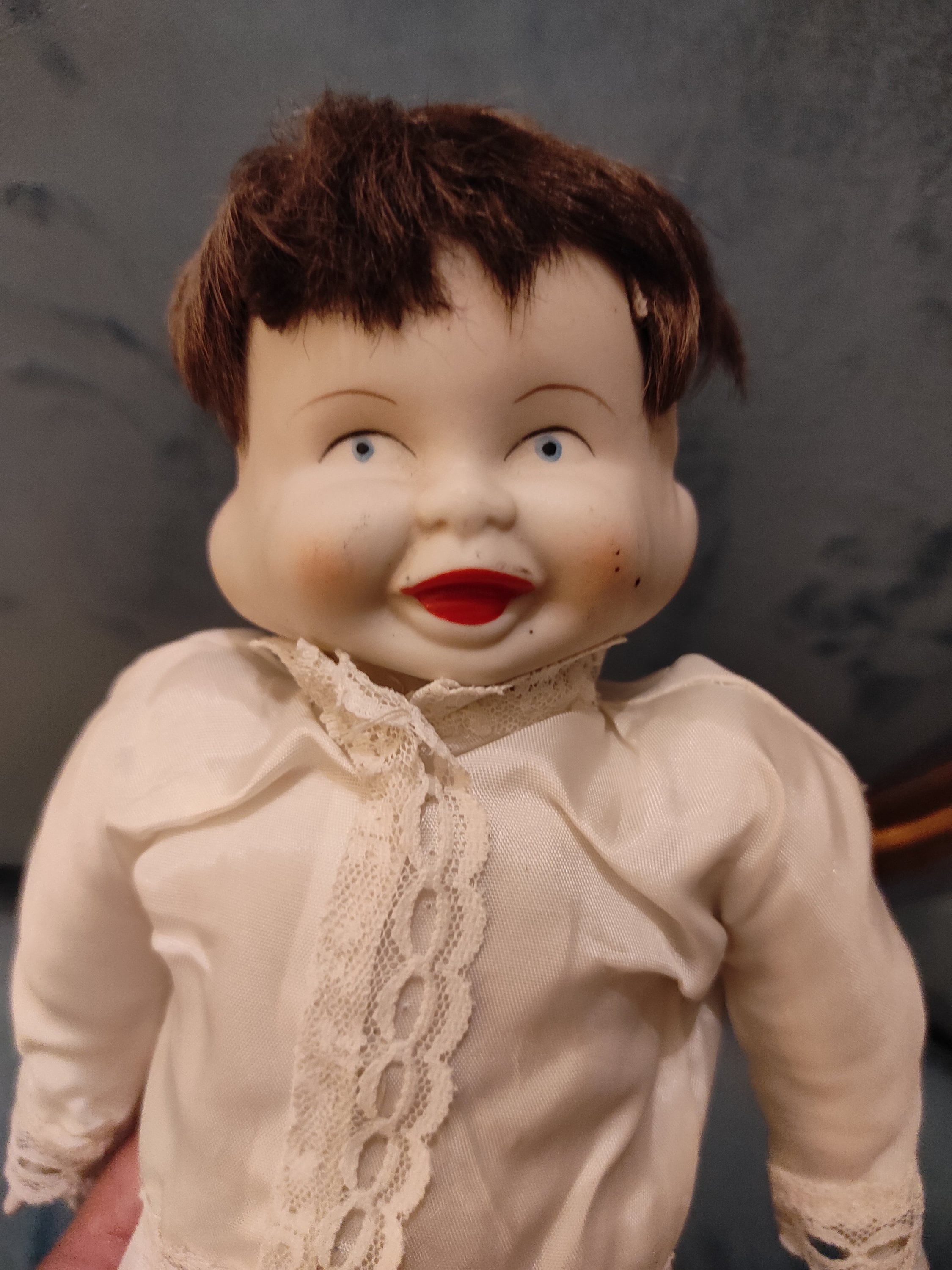 Antique porcelain doll sales with 3 faces