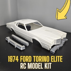 Peut inclure: Modèle de kit de voiture RC Ford Torino Elite 1974 en plastique blanc. Le kit comprend la carrosserie, le châssis et les pare-chocs. 1974 Ford Torino Elite RC Model Kit