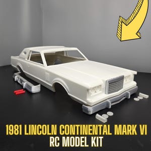May include: A white 1981 Lincoln Continental Mark VI RC model kit. The kit is unassembled and includes various parts, such as the body, wheels, and a grill.