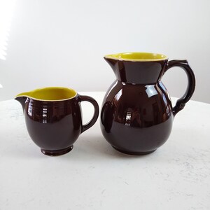 Vintage Hall pitchers, set of two, dark brown with yellow interior, 8 cup and 3 cup