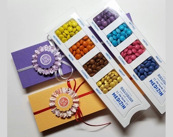 Pilulier emballage cadeau avec boutons en chocolat