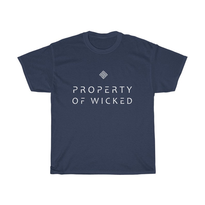 May include: A navy blue t-shirt with a white geometric design and the text "PROPERTY OF WICKED" in white.