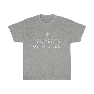 May include: A gray t-shirt with a white geometric design and the text "PROPERTY OF WICKED" printed on the front.