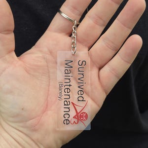 Survived Maintenence Keychain