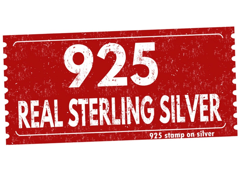May include: Red stamp with white text that reads "925 REAL STERLING SILVER" and "925 stamp on silver".