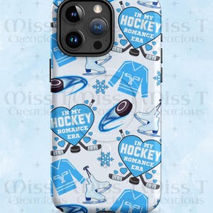 May include: A white phone case with a repeating pattern of blue hockey-themed graphics. The design includes hockey jerseys, skates, pucks, snowflakes, and hearts with the text "IN MY HOCKEY ROMANCE ERA."