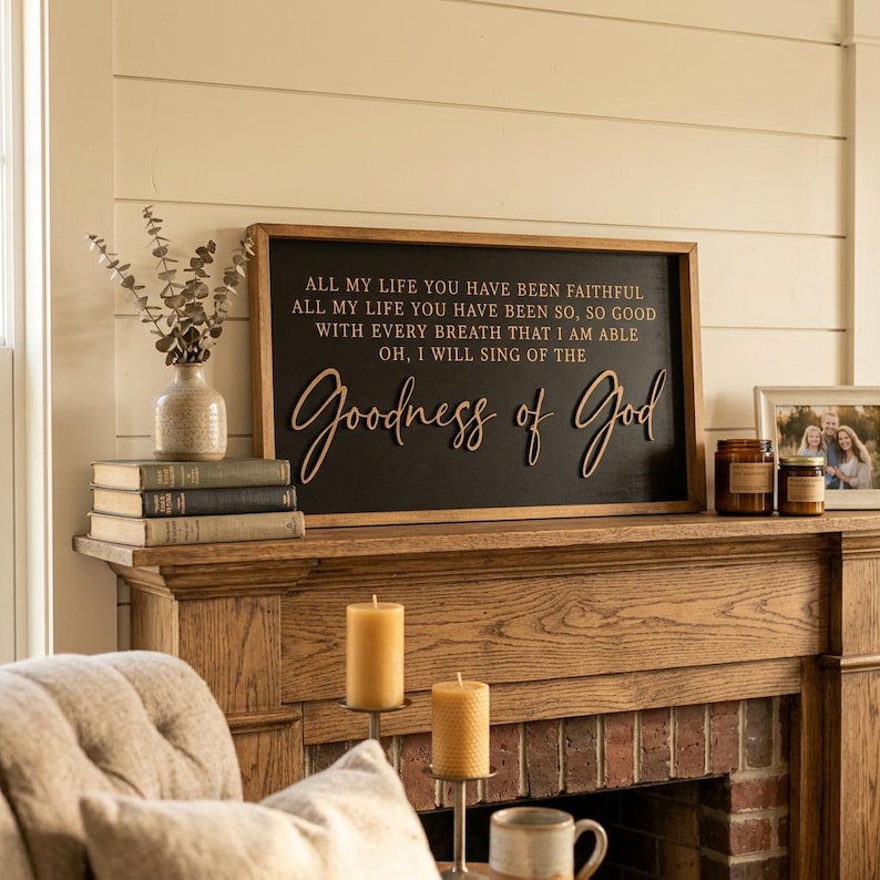 May include: A rectangular wooden sign with a black background and a natural wood frame. The sign features gold lettering that reads: ALL MY LIFE YOU HAVE BEEN FAITHFUL, ALL MY LIFE YOU HAVE BEEN SO, SO GOOD, WITH EVERY BREATH THAT I AM ABLE, OH, I WILL SING OF THE Goodness of God.