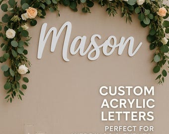 May include: White acrylic letters spelling "Mason" against a neutral background, adorned with greenery and flowers. The image also displays the text "CUSTOM ACRYLIC LETTERS" and "PERFECT FOR WEDDINGS & EVENTS".