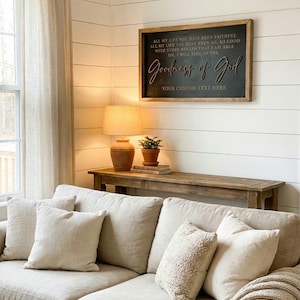 May include: A rectangular wooden wall sign with a black background and a natural wood frame. The sign features white and raised brown lettering that reads: ALL MY LIFE YOU HAVE BEEN FAITHFUL, ALL MY LIFE YOU HAVE BEEN SO, SO GOOD, WITH EVERY BREATH THAT I AM ABLE, OH, I WILL SING OF THE Goodness of God, YOUR CUSTOM TEXT HERE.