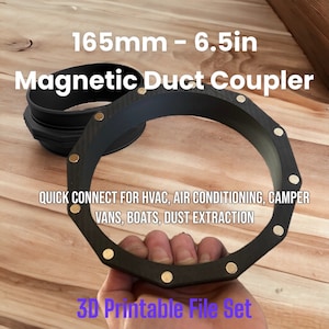 Könnte beinhalten: Ein schwarzer magnetischer Kanalverbinder mit goldenen Akzenten mit einem Durchmesser von 165 mm. Der Verbinder ist 3D-druckbar und für schnelle Verbindungsanwendungen für HLK, Klimaanlagen, Wohnmobile, Boote und Staubabsaugung konzipiert.