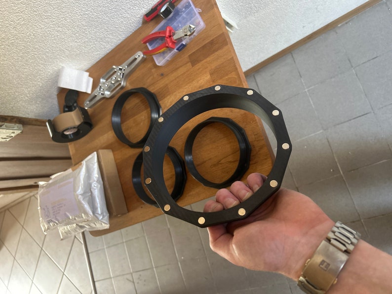 Magnetic duct coupling for flexible ducting systems, available in all common sizes: 50mm, 75mm, 80mm, 100mm, 125mm, 150mm, 160mm, 200mm, 254mm, and 300mm. Designed for HVAC, grow tents, dust collection, laser enclosures, camper vans, and industrial ventilation. Solid 3D printed PETG or ABS rings with embedded magnets for quick connect and tool-free ducting. Custom duct sizes and designs available on request.