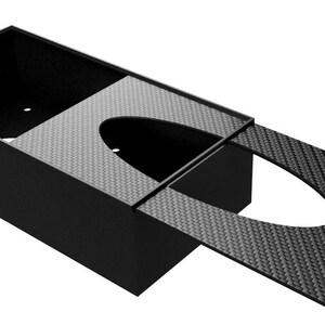 Versatile Carbon Fiber Glove Dispenser, for 22x11x5.5cm glove boxes. Features a modern, recyclable design suitable for professional and home use.