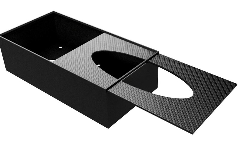 Versatile Carbon Fiber Glove Dispenser, for 22x11x5.5cm glove boxes. Features a modern, recyclable design suitable for professional and home use.