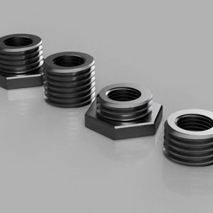 May include: Four black metal pipe thread adapters of different sizes.