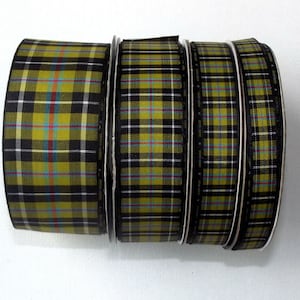 May include: Four rolls of black and yellow tartan ribbon. The ribbon has a subtle sheen and is perfect for crafting and decorating.