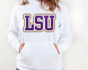 May include: White hoodie with a purple and gold glitter LSU logo.