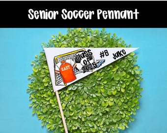 May include: White pennant with black text and a soccer ball graphic. The text reads "Class of 2025" and "#8 Jake".