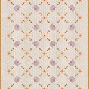 May include: A quilted blanket with a repeating pattern of stylized purple houses and orange floral accents on a cream background. The quilt has a patterned border and is likely handmade.
