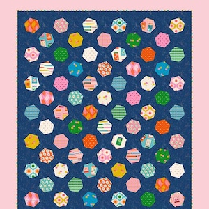 May include: A quilt pattern titled Dancing Hexies by Sew Mariana on a pink background. The quilt features a dark blue textured fabric base with numerous colorful, patterned hexagonal shapes scattered across it. The pattern includes text stating Precut Friendly and No Y Seams, along with a Full Color Pattern label.