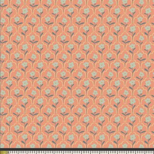 May include: Coral-colored fabric with a repeating floral pattern. The design features light blue flowers with gray stems and leaves, set against a backdrop of a scalloped, yellow-gold outline. The fabric is measured with a ruler in inches.