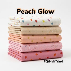 May include: A stack of five fabric pieces in shades of peach, pink, and cream. The top layer is white with colorful star patterns. The text "Peach Glow" and "FQ/Half Yard" are displayed.