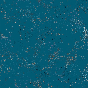 May include: Teal-colored background with a speckled pattern. The pattern features small, irregular dots in shades of orange, gold, black, and purple, scattered across the surface. The overall effect is a textured, abstract design.