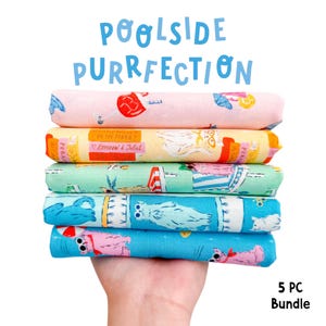 May include: A stack of five colorful fabric rolls with cat-themed illustrations. The rolls are pink, yellow, green, blue, and turquoise, with the text "Poolside Purrfection" in blue above. The bundle is labeled "5 PC Bundle."