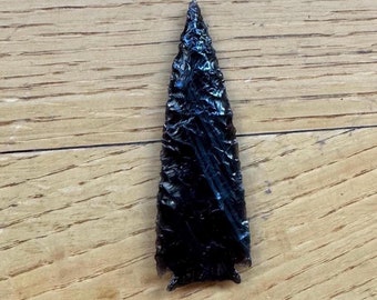 Black and grey banded obsidian corner-notched dart point