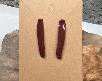 Red glass blade earrings