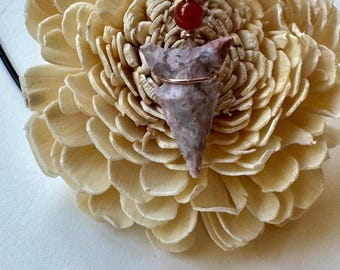 pink chert side-notch arrowhead pendant wrapped in rose gold-filled wire with a carnelian bead accent