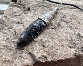 obsidian teardrop pendant wrapped in sterling silver wire