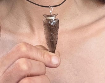 Corner-notched obsidian projectile point pendant with sterling silver wire and fixtures
