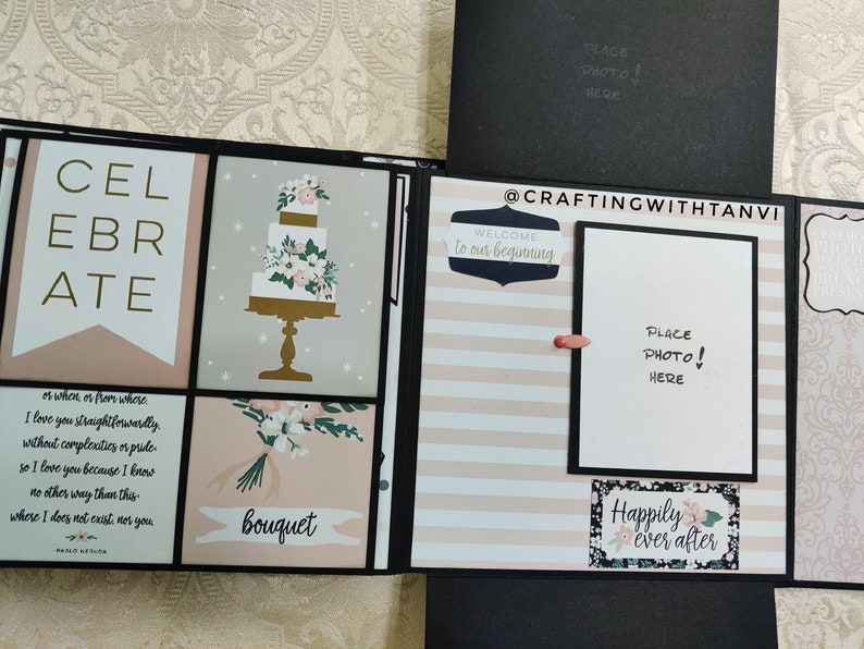May include: A wedding scrapbook with a pink and white striped background. The scrapbook has several pages with photos and text. The text includes "Celebrate", "Welcome to our beginning", "Happily ever after", and "bouquet".