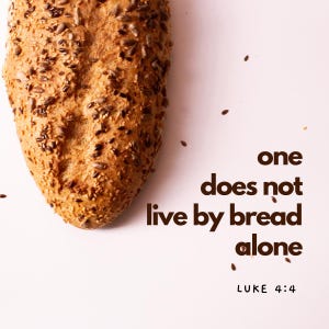 Peut inclure: Une miche de pain avec des graines sur un fond blanc. Le texte "one does not live by bread alone" est écrit en brun sous le pain. Le texte "LUKE 4:4" est écrit en brun plus petit sous la citation.