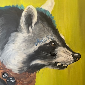 May include: A close-up portrait of a raccoon with a blue and green mohawk, a gold nose ring, and a brown bandana with the words "No Cars, No Masters" on two buttons. The raccoon has a tattoo that says "Road Kill" on its face. The background is a bright yellow.