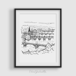 Puede incluir: Dibujo en blanco y negro de una ciudad con un puente y edificios. El dibujo está enmarcado en un marco negro.