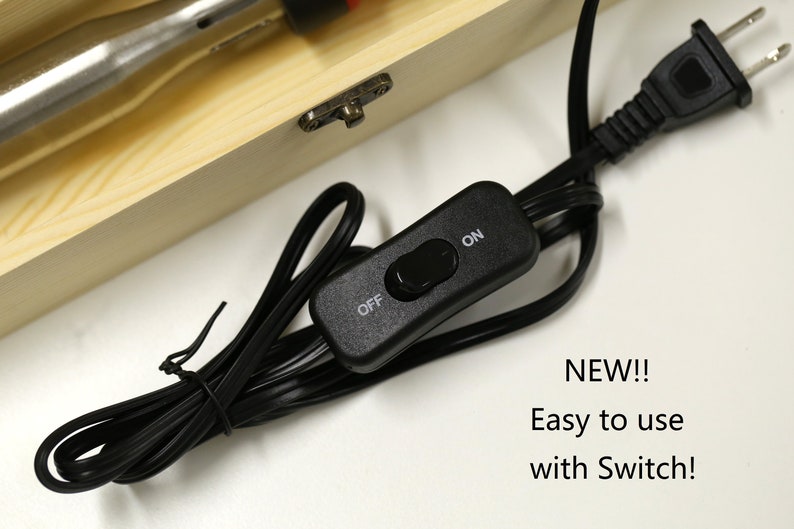 May include: A black electrical cord with a plug and an on/off switch. The cord is coiled and the switch is labeled "ON" and "OFF".