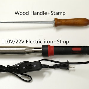 May include: Two tools for stamping metal. The top tool is a wooden handle with a metal stamp attached. The bottom tool is an electric iron with a metal stamp attached. The electric iron has an on/off switch and a power cord.