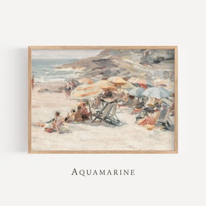 May include: A framed print of a beach scene with people, umbrellas, and beach chairs. The artwork has a vintage aesthetic with soft colors, including beige, light blue, and orange. The word "AQUAMARINE" is printed at the bottom.