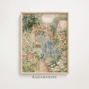 May include: Watercolor painting of a garden scene with a path leading to a small gate. The garden is filled with colorful flowers and lush greenery. The painting is framed in a light wood frame. The word "Aquamarine" is printed at the bottom.