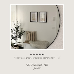 May include: Two framed landscape prints hang above a bench with a striped pillow and a faux fur throw. A potted plant is to the left. The text "They are great, would recommend!" is below the prints. The brand name "AQUAMARINE prints" is at the bottom.