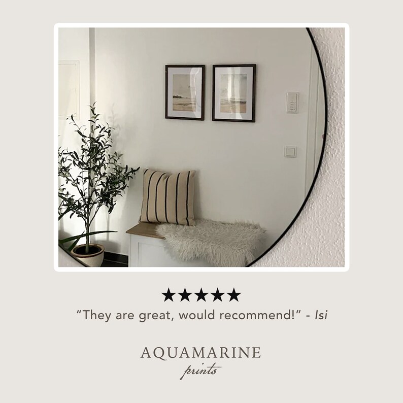 May include: Two framed landscape prints hang above a bench with a striped pillow and a faux fur throw. A potted plant is to the left. The text "They are great, would recommend!" is below the prints. The brand name "AQUAMARINE prints" is at the bottom.