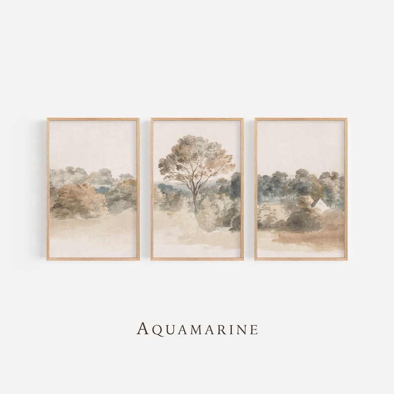 May include: Three framed landscape art prints, each with a watercolour painting of trees and forest scenes in muted beige, brown, and green tones. The word "AQUAMARINE" is printed below the frames.